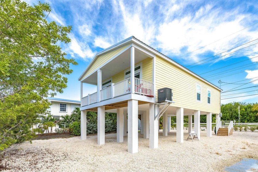 Bring your water toys &amp; experience island living in this newly - photo 3