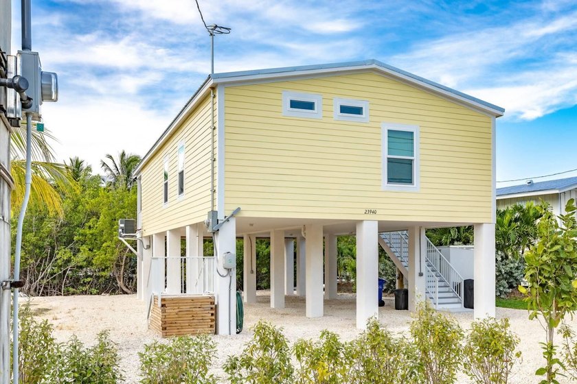 Bring your water toys &amp; experience island living in this newly - photo 4