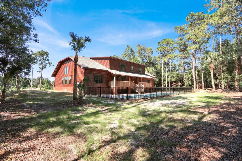 Stunning custom 4BR/3BA POOL home with 2-car garage and nearly 5 - photo 50