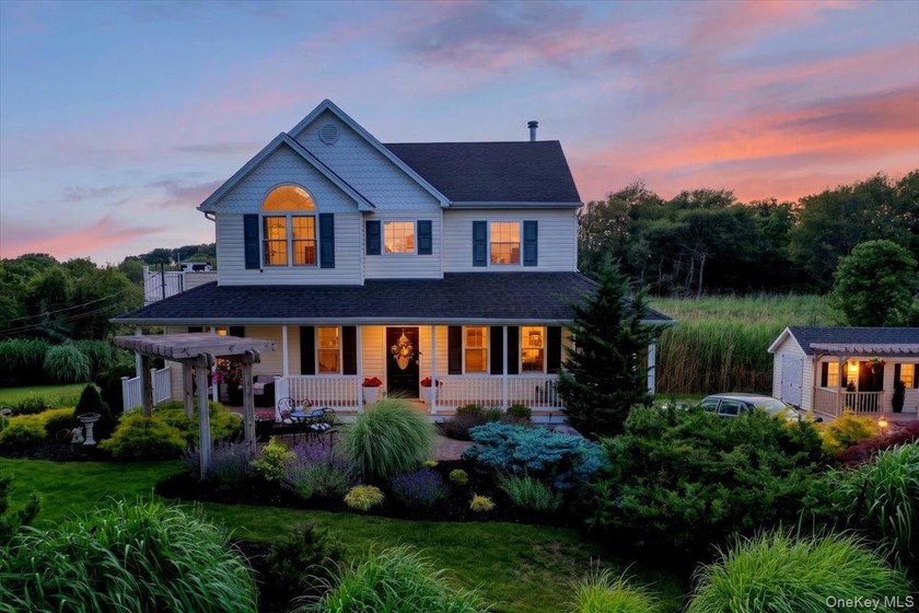 Here, at 266 Clinton Avenue, East Patchogue; a coastal haven - photo 2