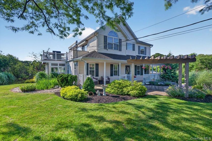 Here, at 266 Clinton Avenue, East Patchogue; a coastal haven - photo 5