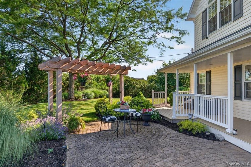 Here, at 266 Clinton Avenue, East Patchogue; a coastal haven - photo 7