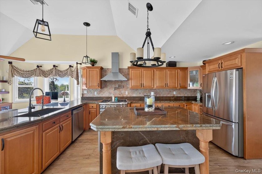 Here, at 266 Clinton Avenue, East Patchogue; a coastal haven - photo 8