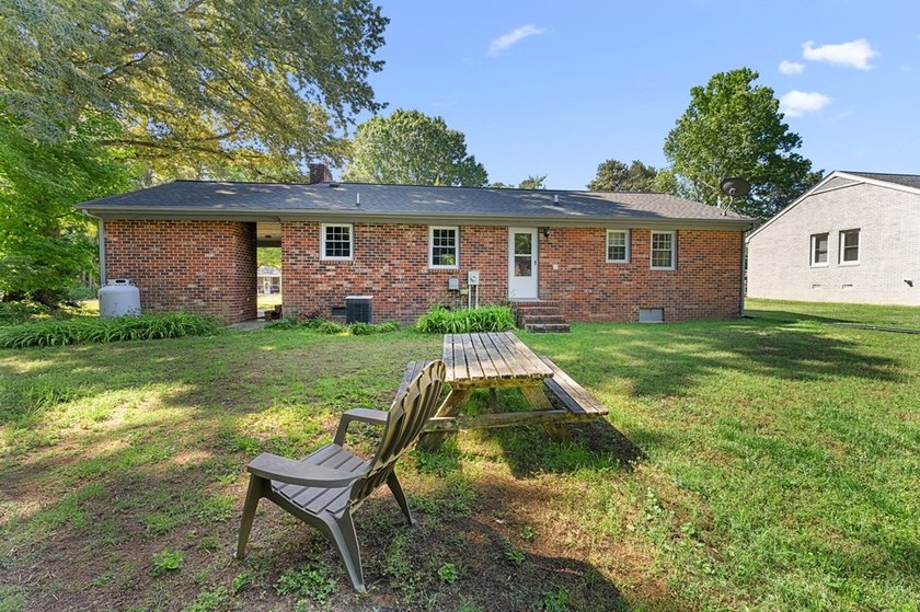 3 bedroom 1 1/2 bath brick rancher with attached carport and - photo 2