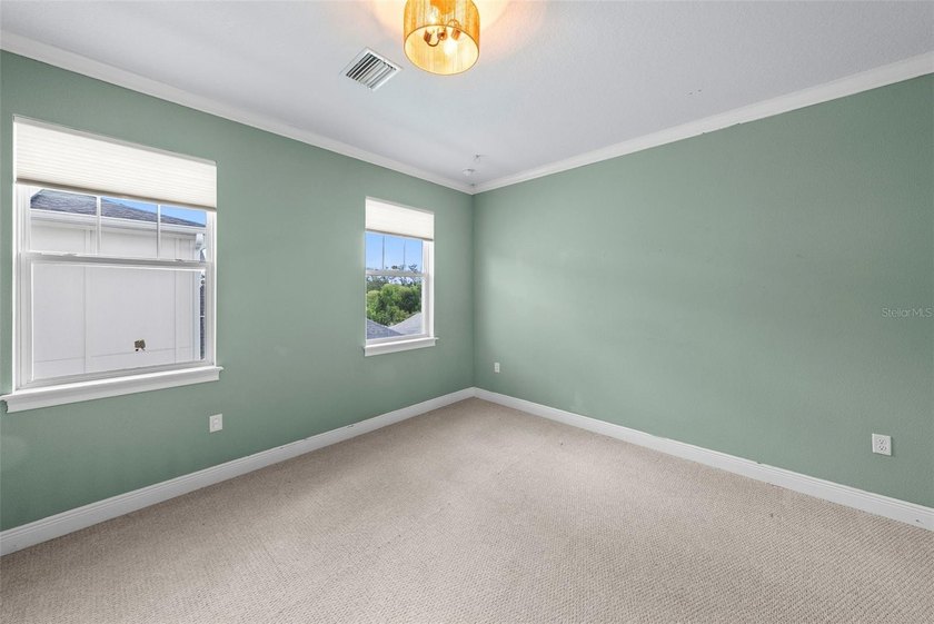 Welcome to 11213 Moultrie Place, where thoughtful design - photo 17