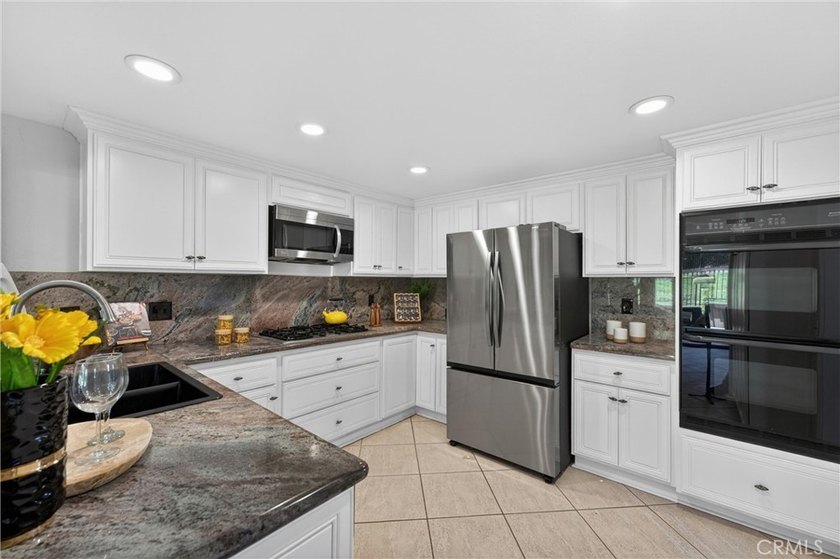 Welcome to this beautifully maintained residence in the highly - photo 20