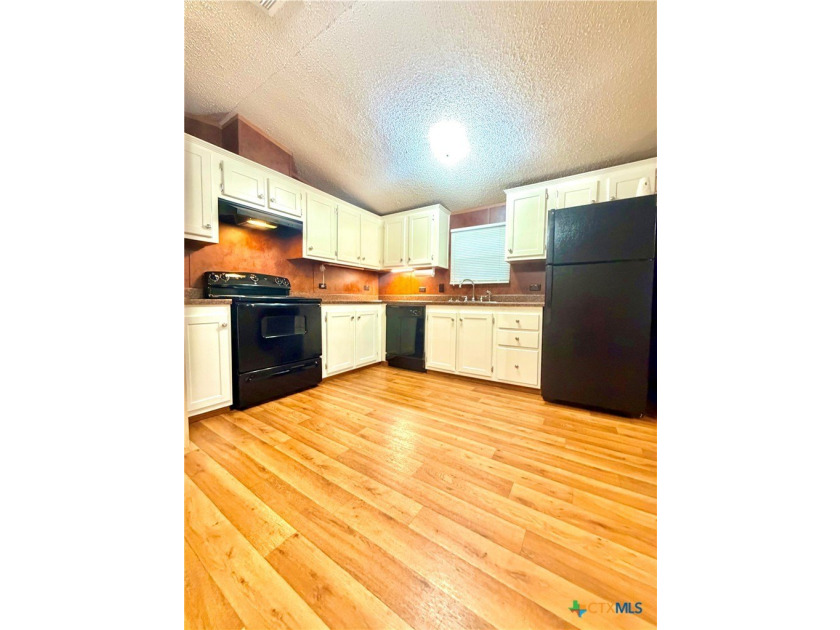 Welcome home. This 3 bedroom, 2 bath home has been crafted and - photo 4