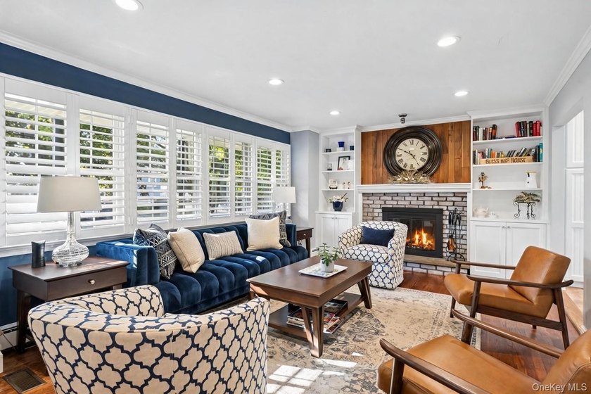 The brick driveway and lovely porch welcome you to this turnkey - photo 8