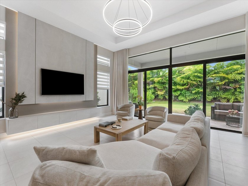 Welcome to this stunning 2025 built home in Lotus Edge, set on - photo 11