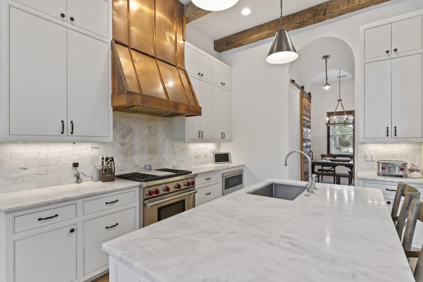 Tucked within the exclusive, gated waterfront community of - photo 12