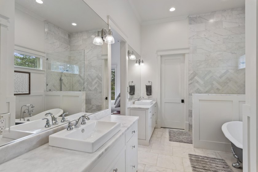 Tucked within the exclusive, gated waterfront community of - photo 19