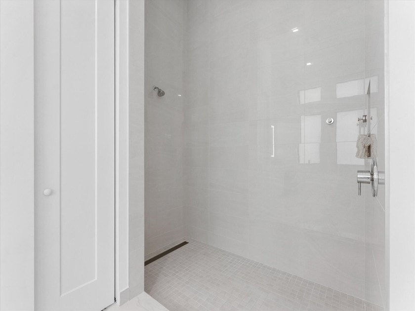Welcome to this stunning 2025 built home in Lotus Edge, set on - photo 19