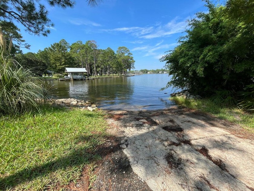 Tucked within the exclusive, gated waterfront community of - photo 45