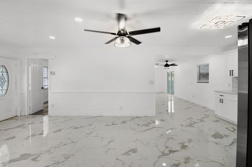 Fully renovated 3-bedroom, 2-bath home featuring a desirable - photo 7