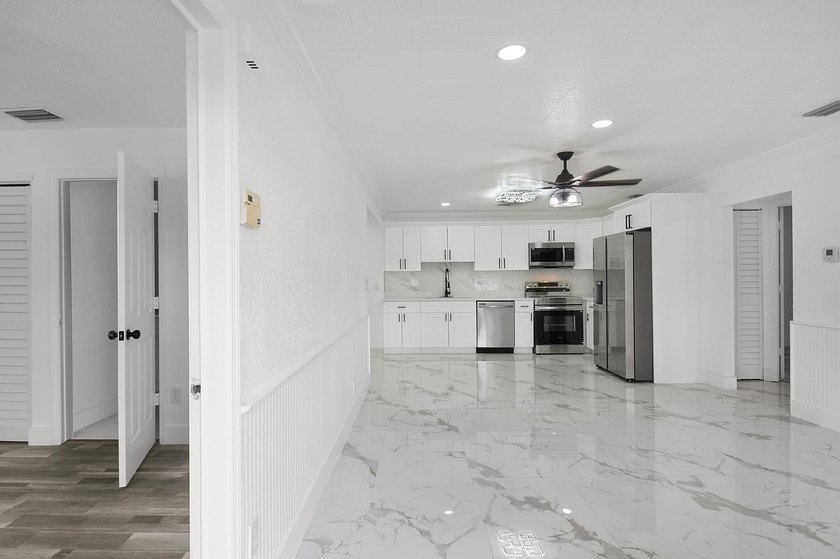 Fully renovated 3-bedroom, 2-bath home featuring a desirable - photo 8