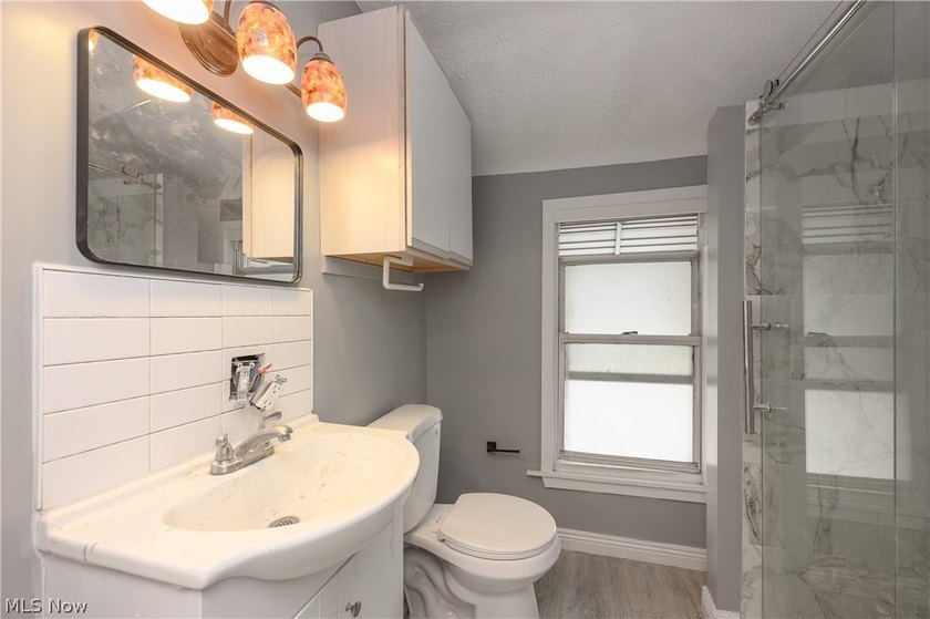 Welcome home to this recently updated Colonial conveniently - photo 10