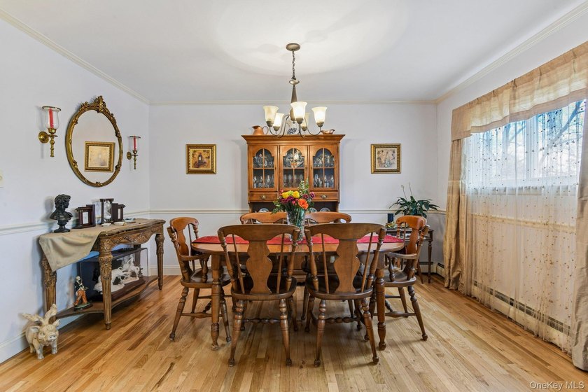 Welcome to this spacious 4-bedroom, 1.5-bath high ranch nestled - photo 11