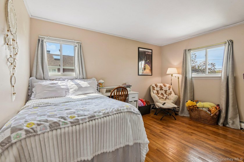 Welcome to this spacious 4-bedroom, 1.5-bath high ranch nestled - photo 17