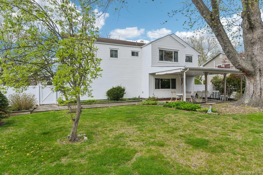 Welcome to this spacious 4-bedroom, 1.5-bath high ranch nestled - photo 24
