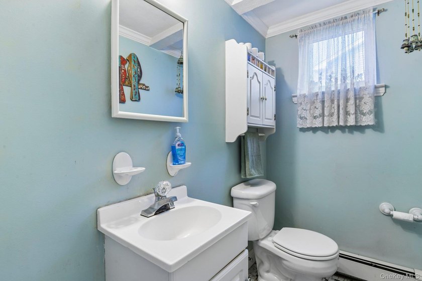 Welcome to this spacious 4-bedroom, 1.5-bath high ranch nestled - photo 32