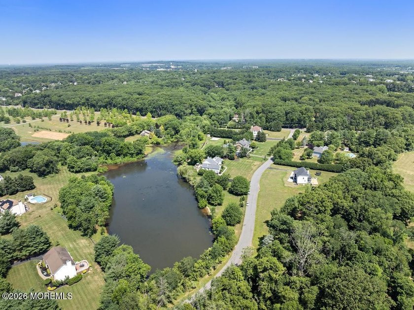 Set on 4.66 serene, private acres with a beautifully landscaped - photo 4