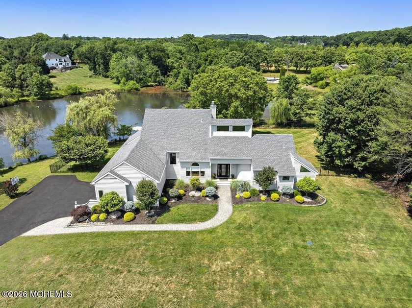 Set on 4.66 serene, private acres with a beautifully landscaped - photo 5