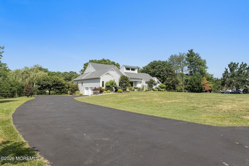 Set on 4.66 serene, private acres with a beautifully landscaped - photo 9