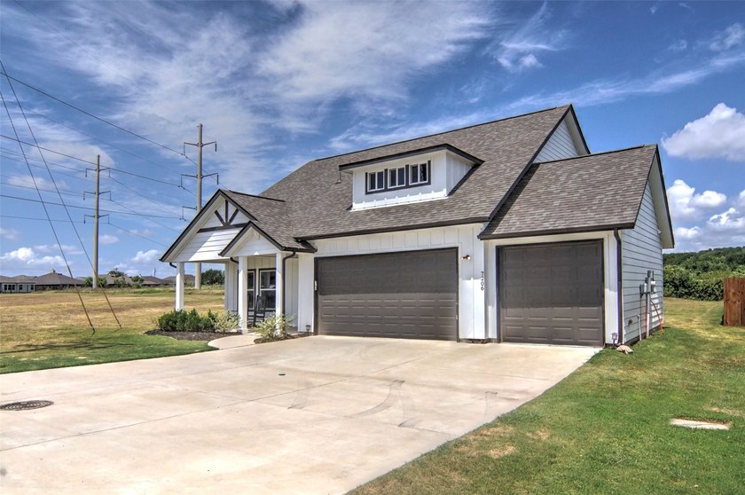 Welcome to this beautifully designed two-story home in the gated - photo 3