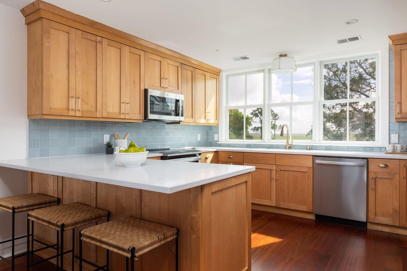 Nestled in the waterfront community of Toler's Cove, this - photo 3