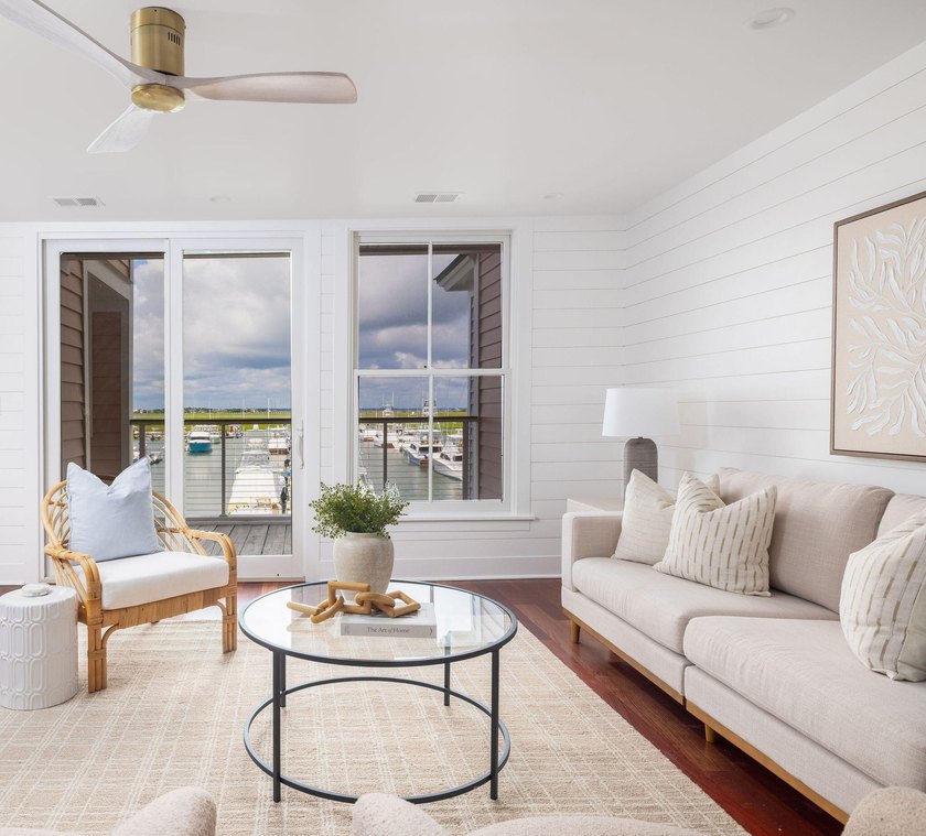 Nestled in the waterfront community of Toler's Cove, this - photo 4