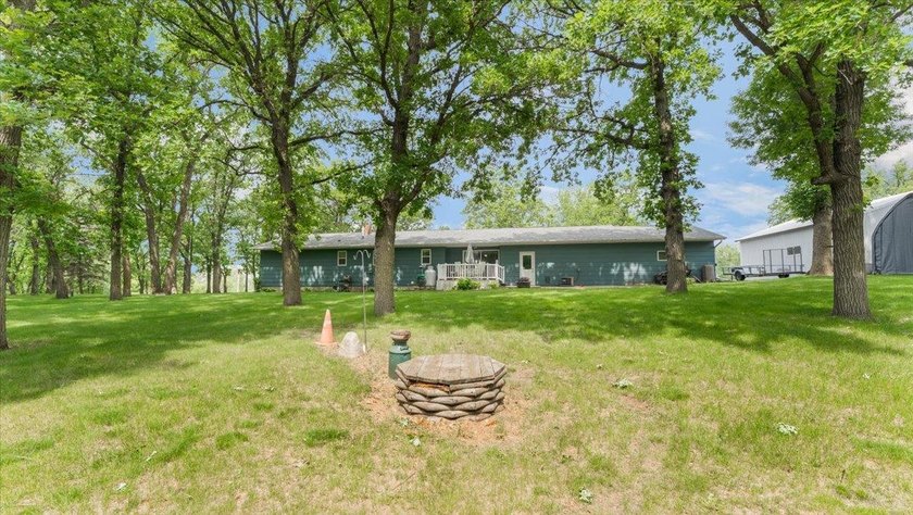 Welcome to this spacious 4-bedroom, 3-bath rambler just minutes - photo 35