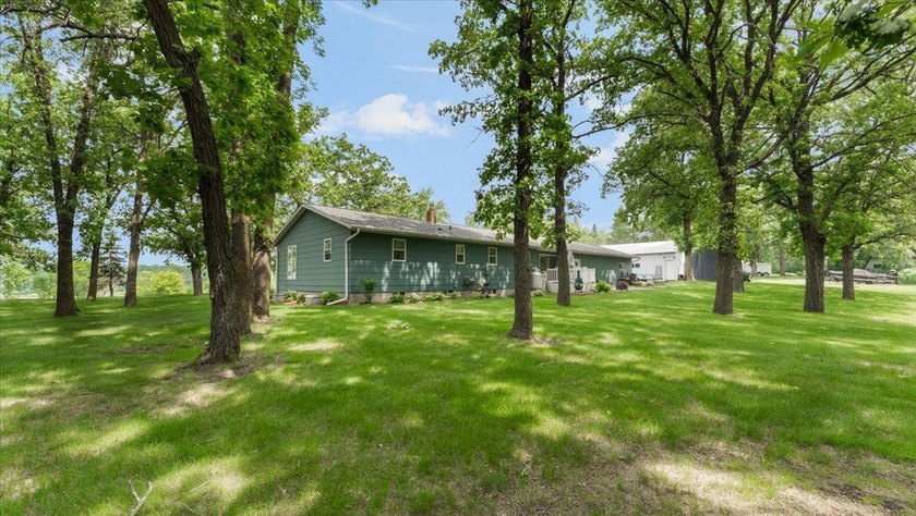 Welcome to this spacious 4-bedroom, 3-bath rambler just minutes - photo 40