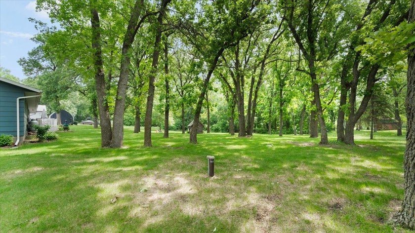 Welcome to this spacious 4-bedroom, 3-bath rambler just minutes - photo 41