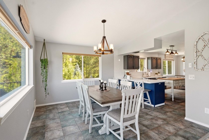 Situated on a sprawling 23-acre property along the serene shores - photo 7