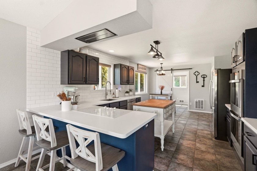 Situated on a sprawling 23-acre property along the serene shores - photo 8