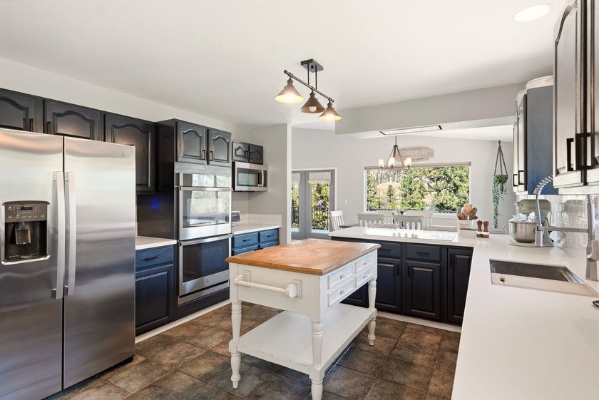 Situated on a sprawling 23-acre property along the serene shores - photo 9