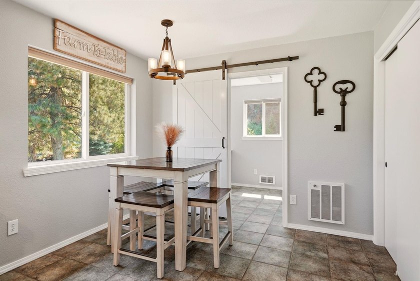 Situated on a sprawling 23-acre property along the serene shores - photo 10