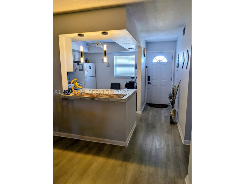 Tucked away on the fourth floor of the welcoming 55+ community - photo 7