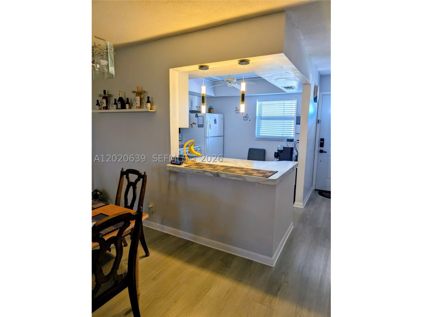Tucked away on the fourth floor of the welcoming 55+ community - photo 8