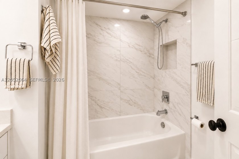 Welcome to this beautifully renovated first-floor condo in the - photo 13