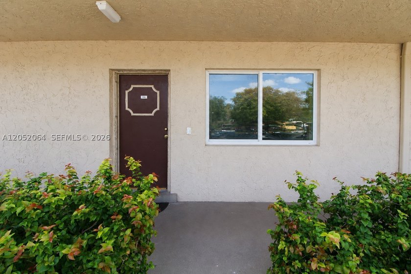 Welcome to this beautifully renovated first-floor condo in the - photo 14