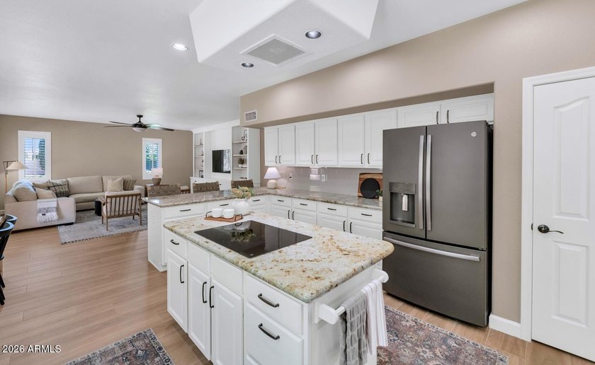 Tucked away on nearly 3/4 of an acre in the prestigious - photo 18