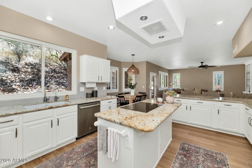 Tucked away on nearly 3/4 of an acre in the prestigious - photo 20