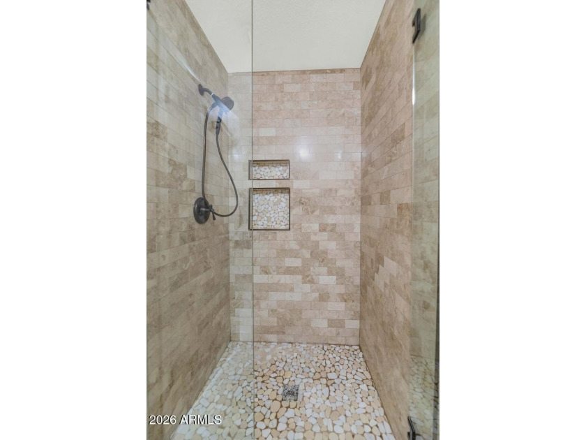 Tucked away on nearly 3/4 of an acre in the prestigious - photo 24
