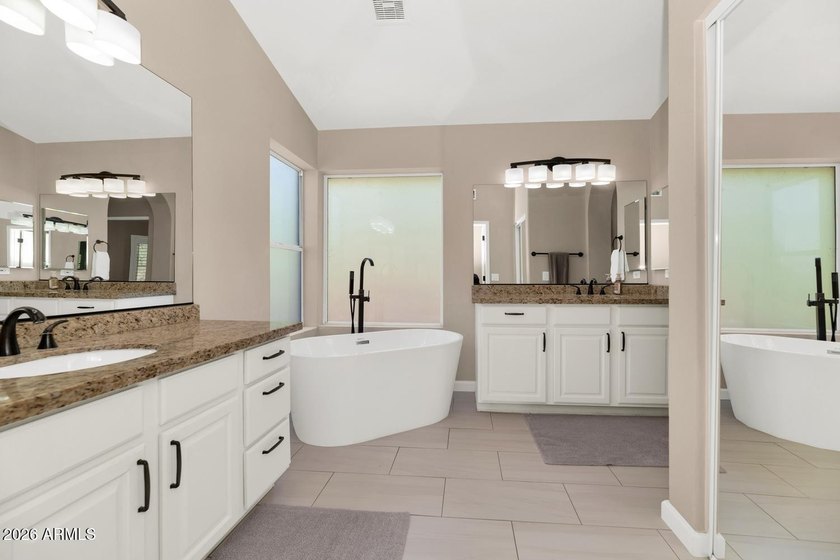 Tucked away on nearly 3/4 of an acre in the prestigious - photo 25