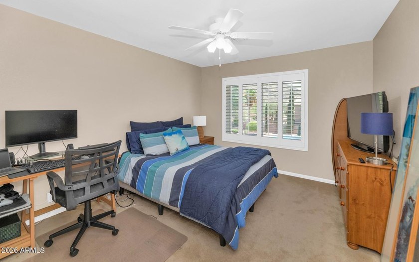 Tucked away on nearly 3/4 of an acre in the prestigious - photo 28