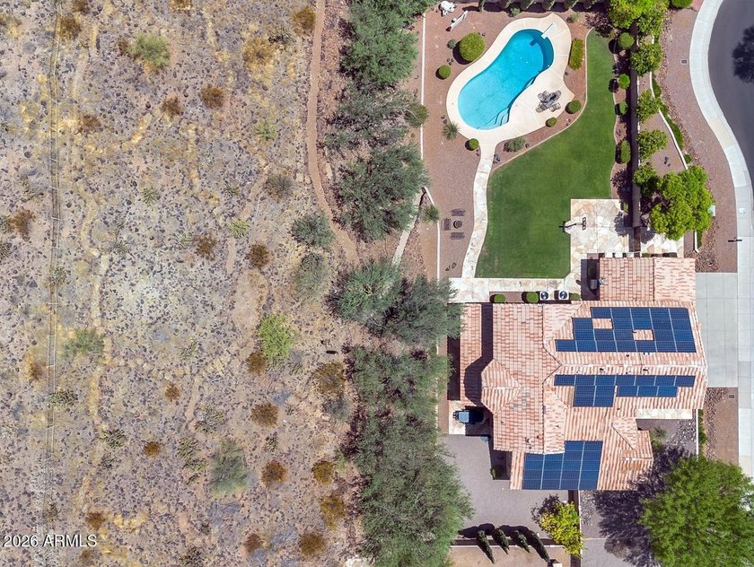Tucked away on nearly 3/4 of an acre in the prestigious - photo 49
