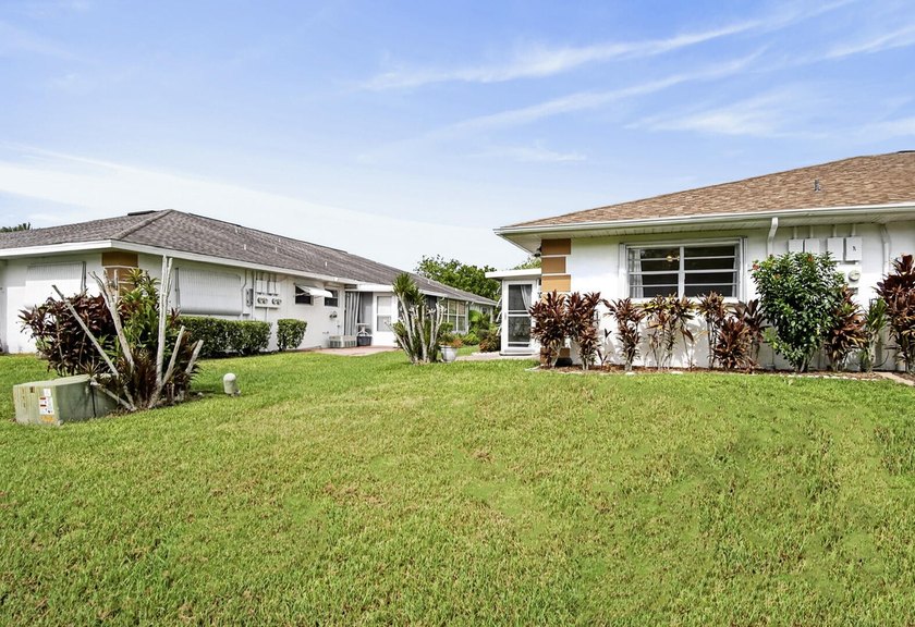 Welcome to this beautifully maintained villa in the desirable - photo 40