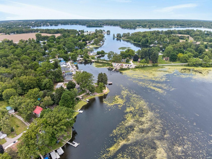 Tucked along the peaceful shores of Backwater Lake, this - photo 9