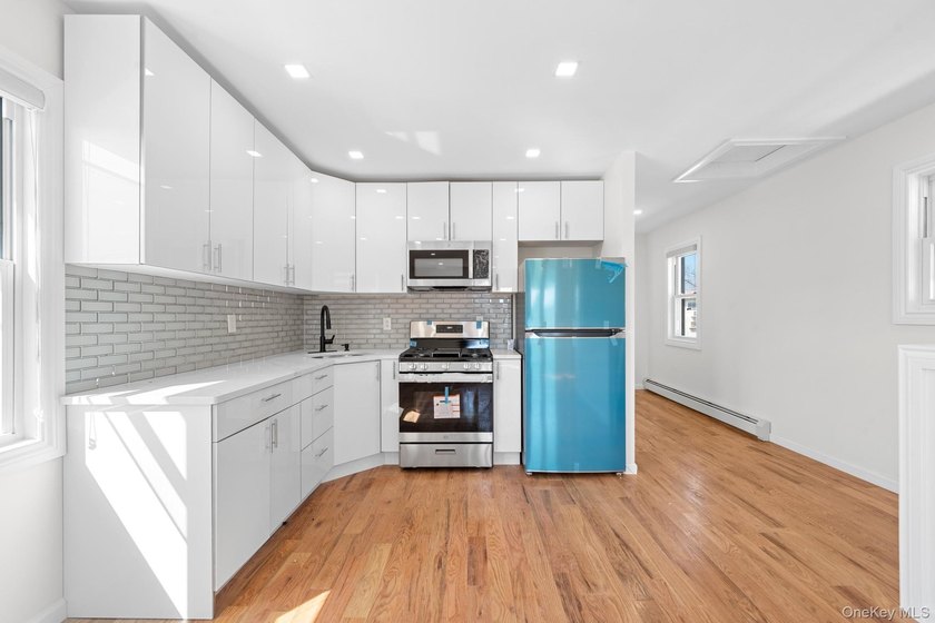 Opportunity Knocks! 148-01 133rd Avenue is a newly renovated - photo 3